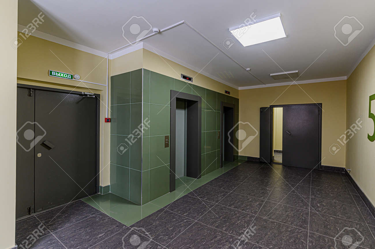 Russia, Moscow- February 07, 2020: interior public place, house entrance. doors, walls, corridors staircase - 152628245 Russia, Moscow- February 07, 2020: interior public place, house entrance. doors, walls, corridors staircase - 152628245