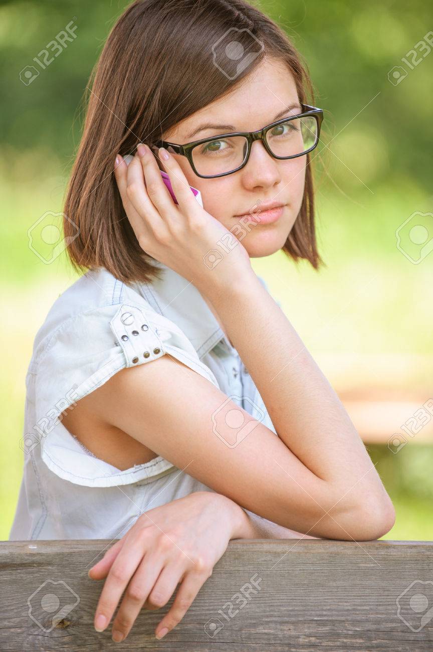 Pretty Young Woman Talking Phone Short Hair Wearing Glasses