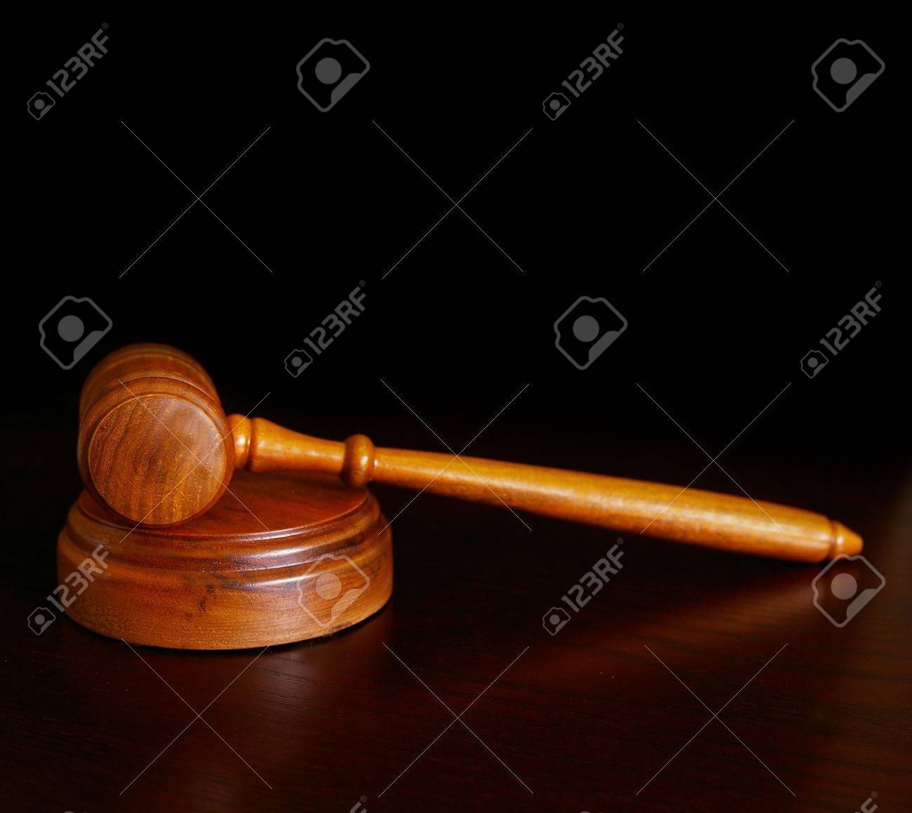 court gavel on desk over dark background stock photo picture and