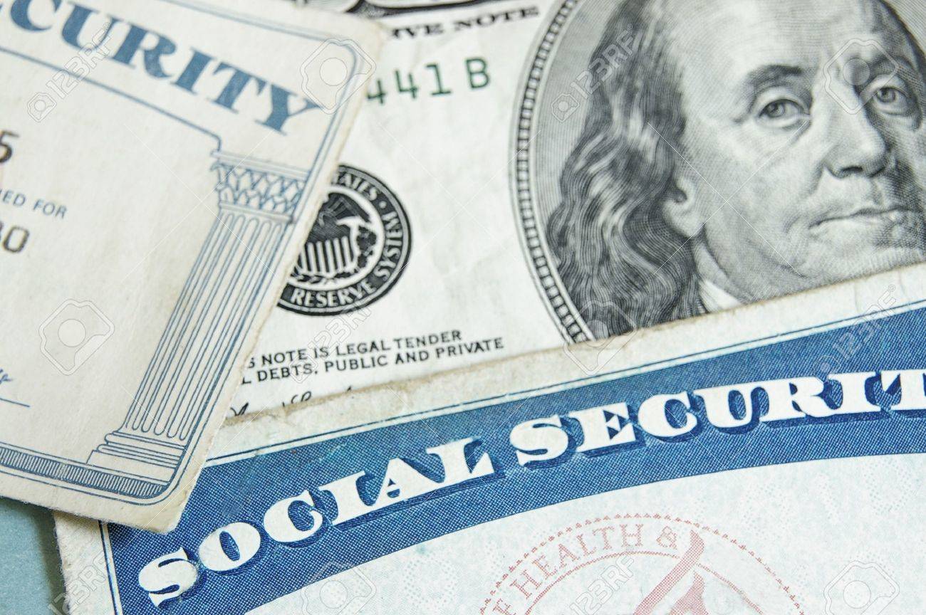 social security cards and US money - retirement concept - 15173891 social security cards and US money - retirement concept - 15173891