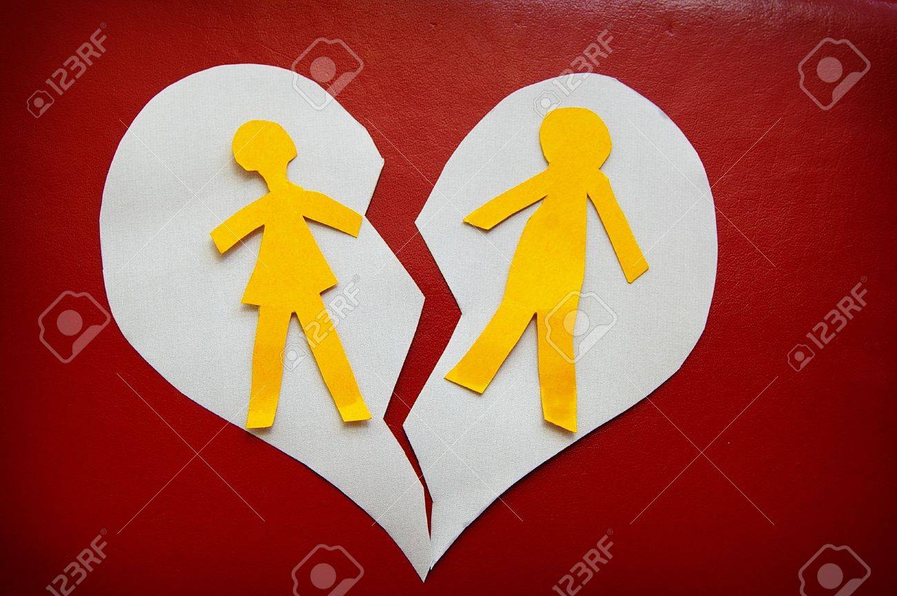 paper cutout couple on a torn heart - divorce concept - 16081360 paper cutout couple on a torn heart - divorce concept - 16081360