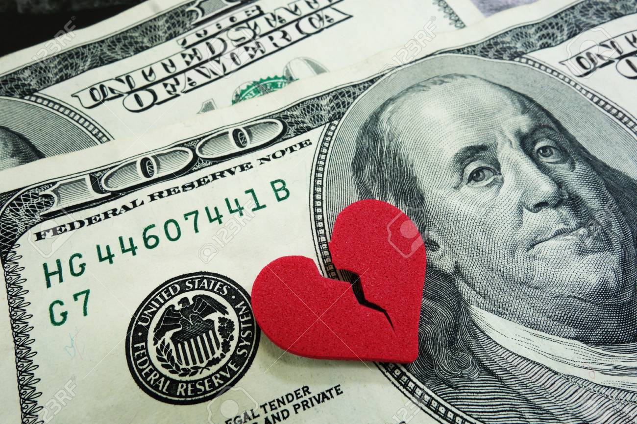 closeup of a broken red heart on cash - divorce concept - 20787308 closeup of a broken red heart on cash - divorce concept - 20787308