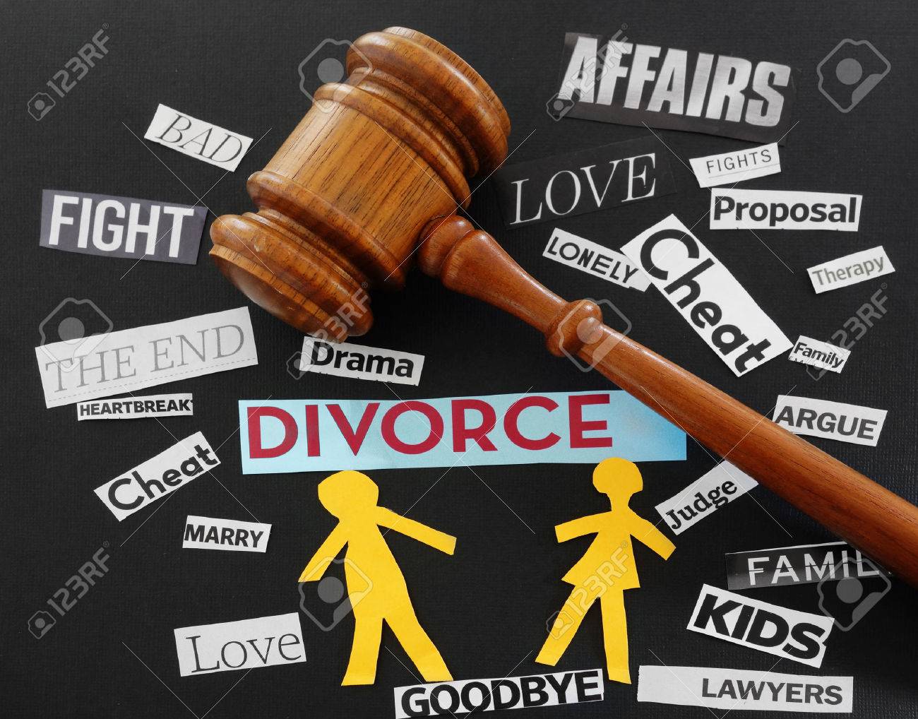 Paper couple with gavel and divorce related messages - 34631342 Paper couple with gavel and divorce related messages - 34631342