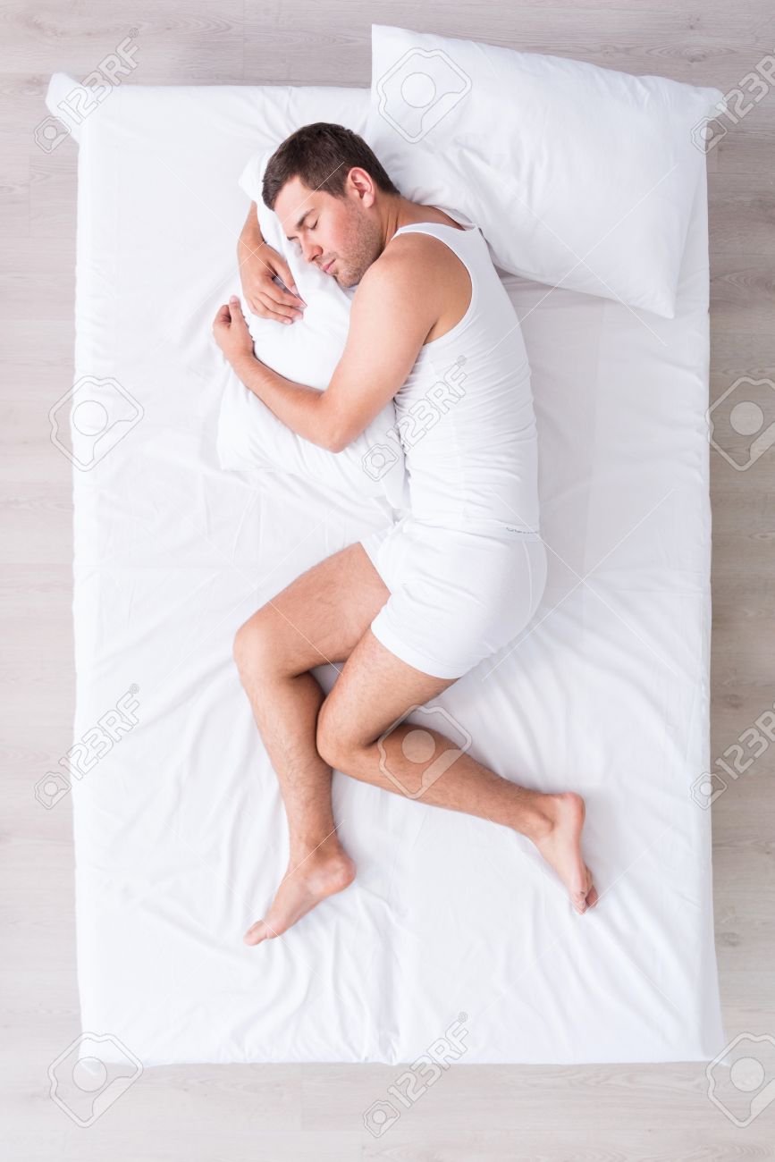 hugging the pillow while sleeping