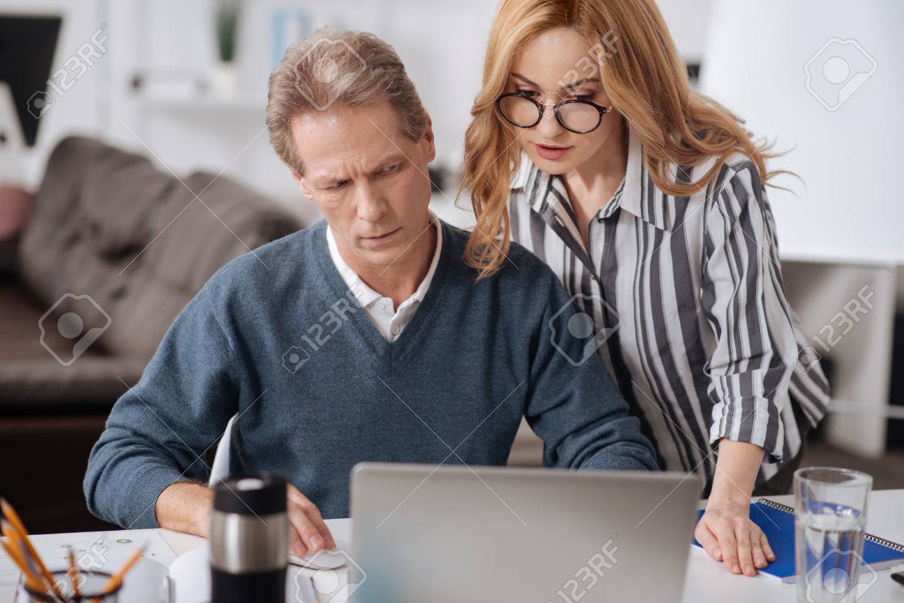 Sexy Businesswoman Seducing Mature Colleague In The Office Stock Photo,  Picture and Royalty Free Image. Image 75355561.