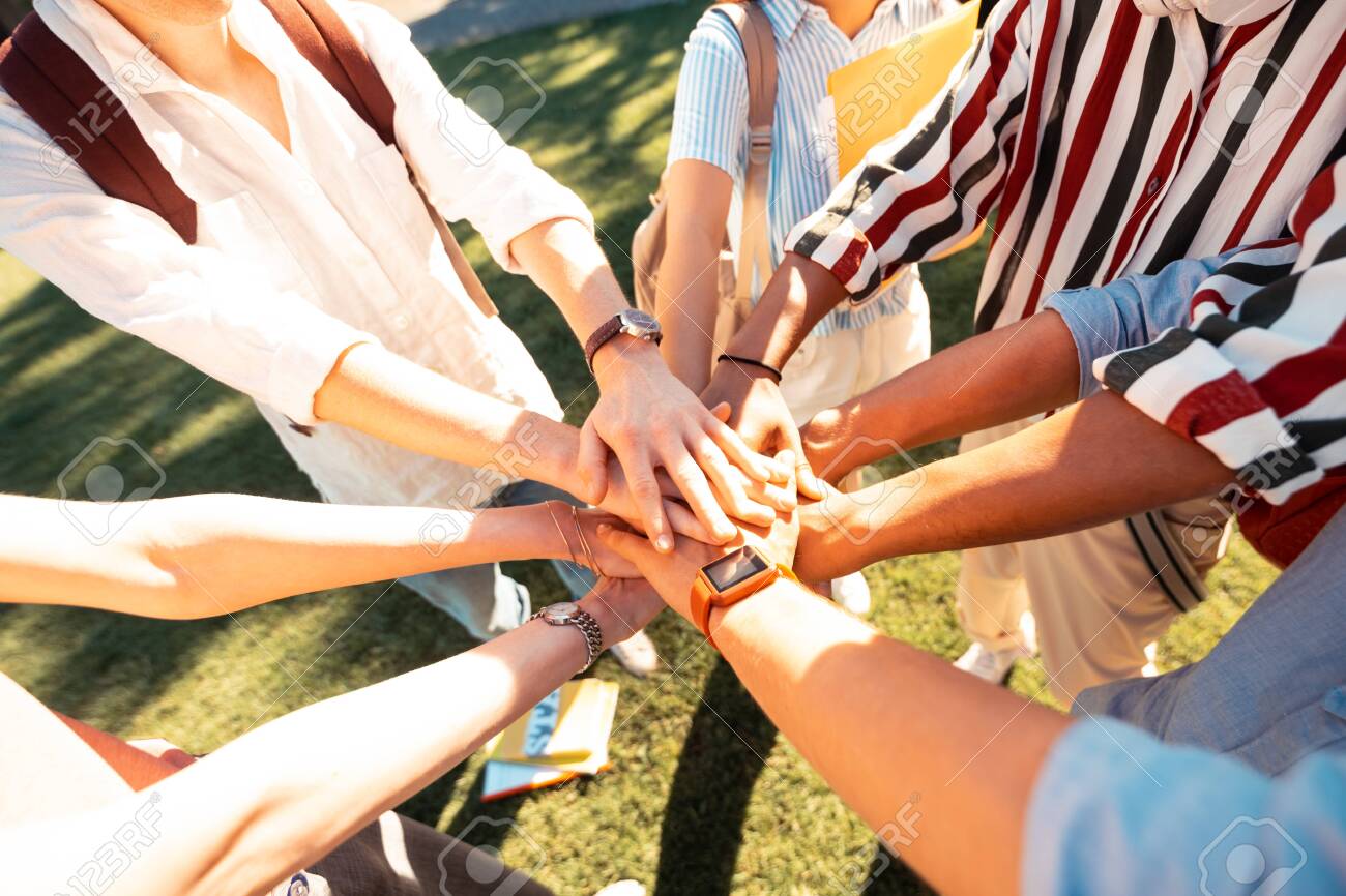 Best Friends Forever. Hands Of Happy Groupmates Lying One On ...