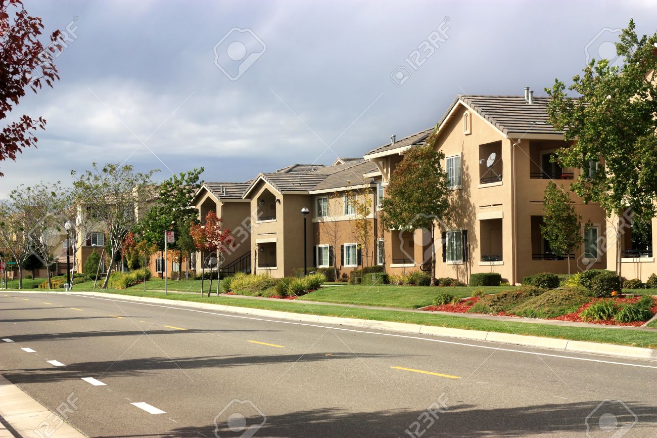 Apartment Complex modern apartment complex in suburban neighborhood stock photo Apartment Complex modern apartment complex in suburban neighborhood stock photo