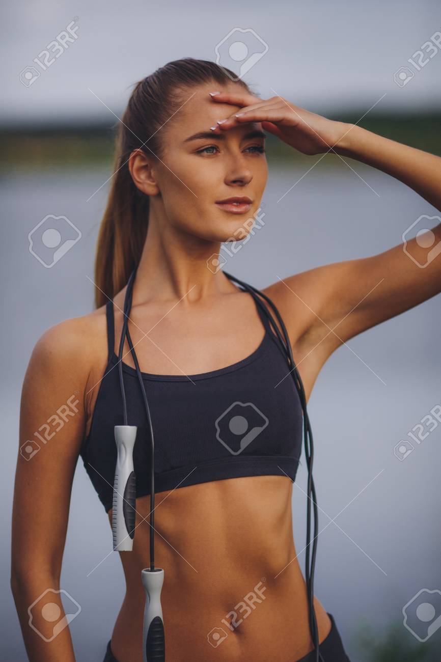 Cute Fit Woman With Skipping Rope Stock Photo, Picture and Royalty Free  Image. Image 81849085.