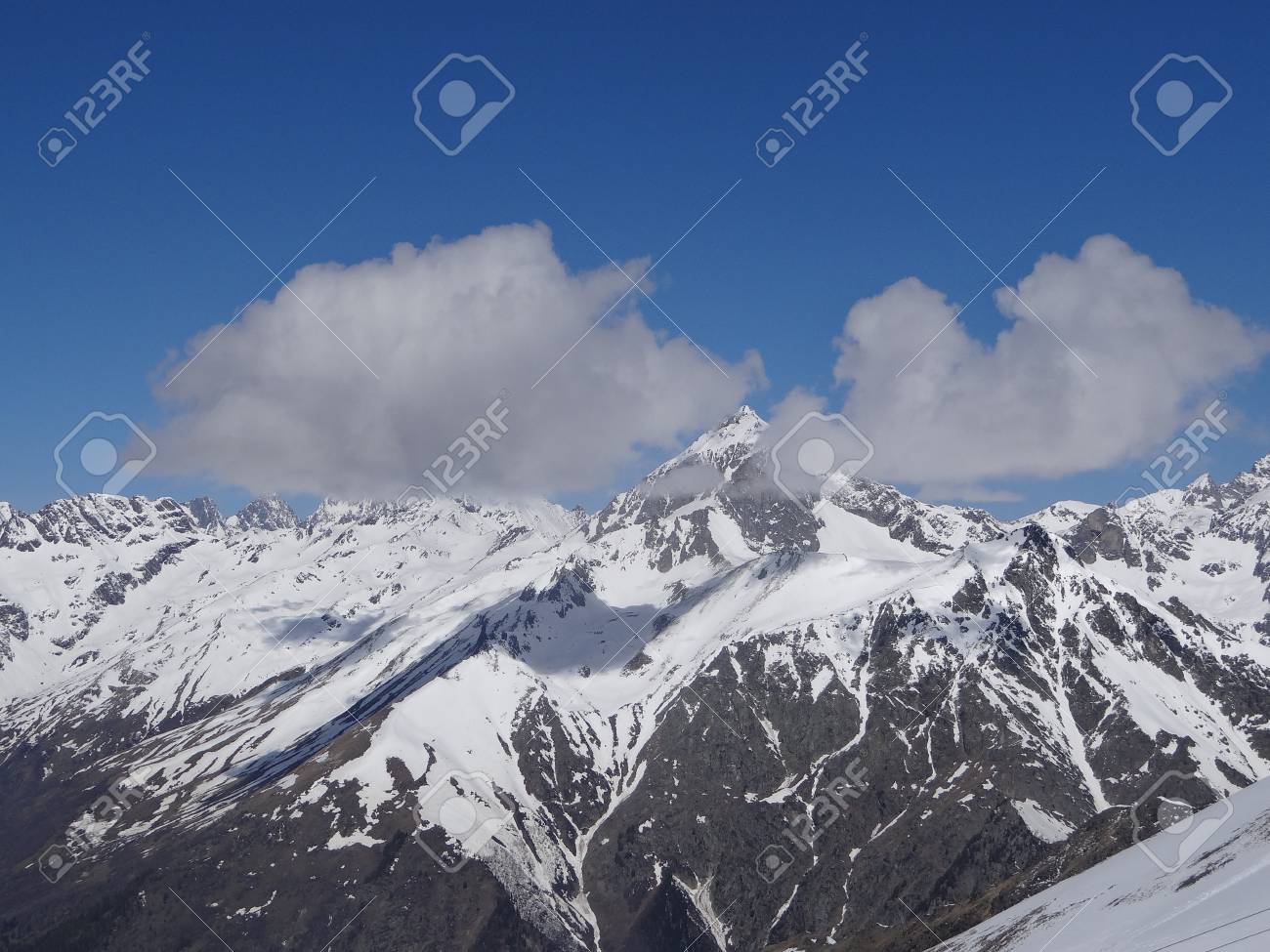 snowy montain peaks with