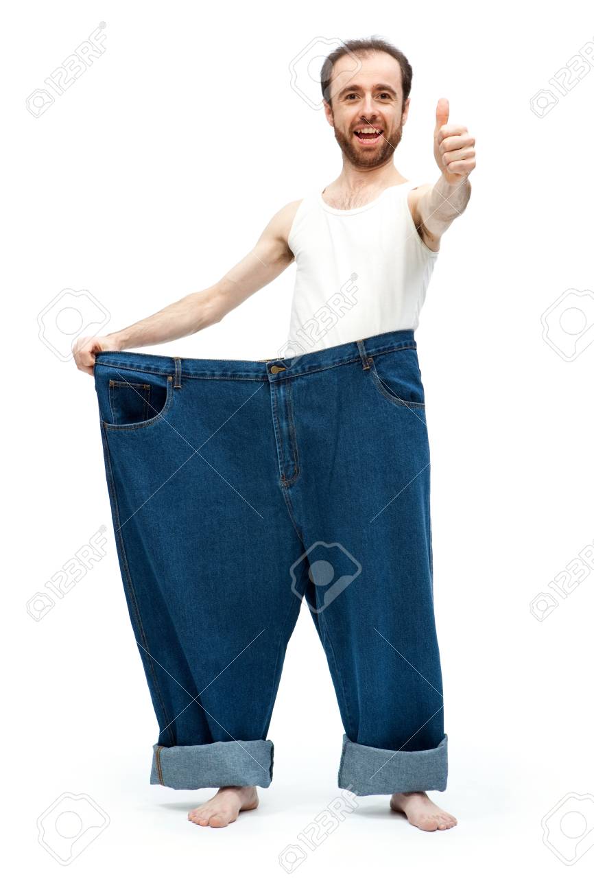 Lustig Schlanker Mann Mit Grossen Jeanshosen Auf Weissem Hintergrund Lizenzfreie Fotos Bilder Und Stock Fotografie Image 56643020