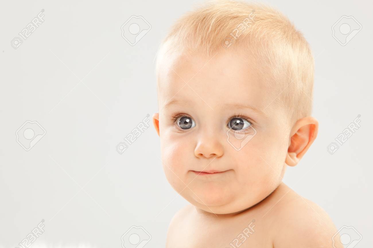 Beautiful Blonde Hair Blue Eyes Baby In A White Room Stock Photo Picture And Royalty Free Image Image 57225875