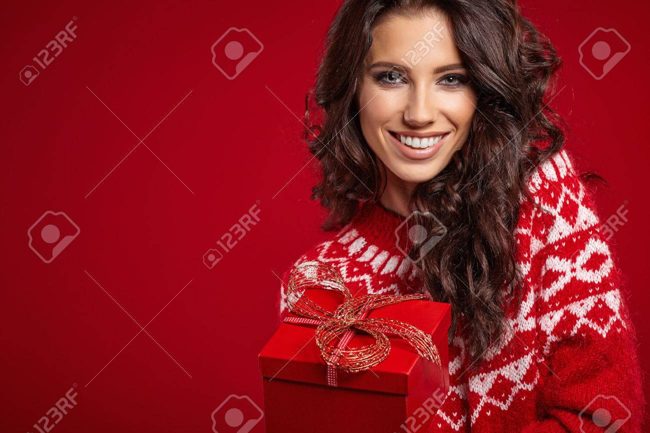 Woman with christmas box gift - 47195625 Woman with christmas box gift - 47195625