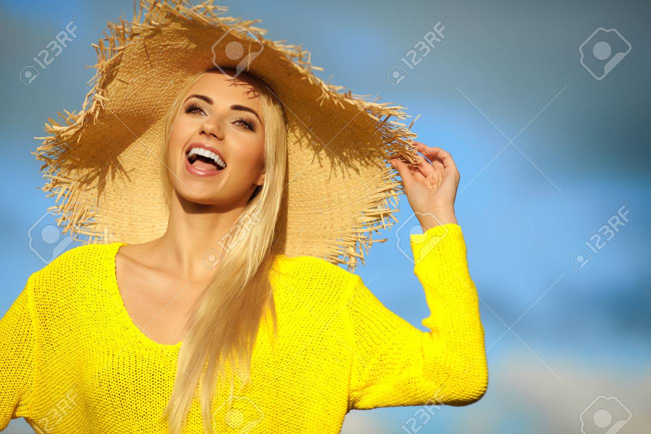 Summer holidays and vacation concept, girl standing on the sky background - 54015972 Summer holidays and vacation concept, girl standing on the sky background - 54015972