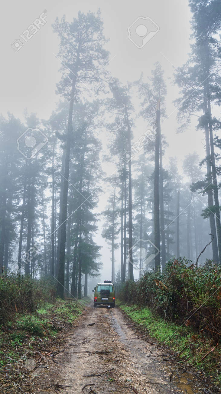 Camper van off road in nature - 166437823 Camper van off road in nature - 166437823