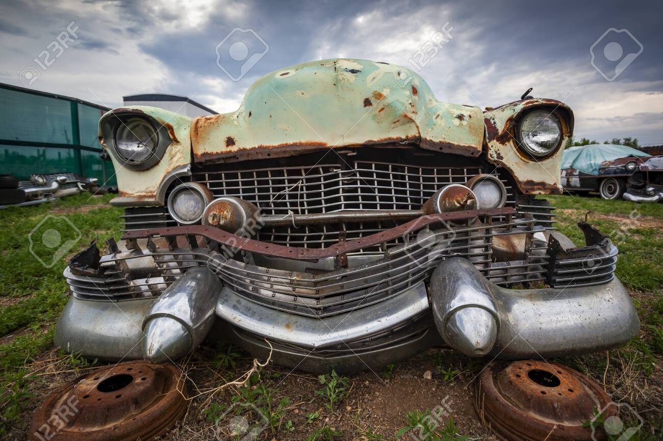Close Up On A Rusty Old Classic Car Front Abandoned With Broken Parts In The Junkyard Stock Photo Picture And Royalty Free Image Image 143489528