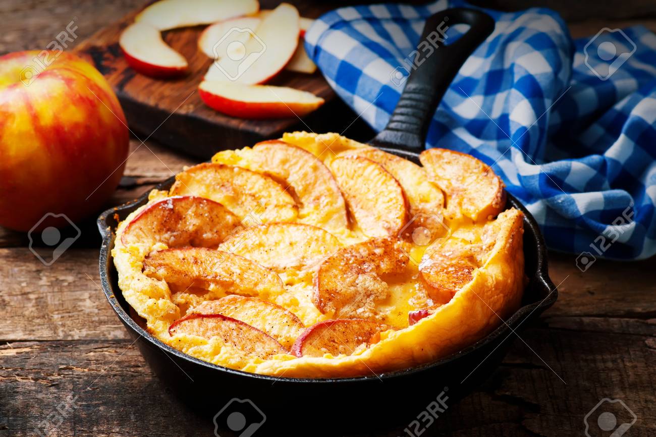 Cinnamon Apple Dutch Baby Pancake In Iron Pan Style Rustic Selective Stock Photo Picture And Royalty Free Image Image 71189545