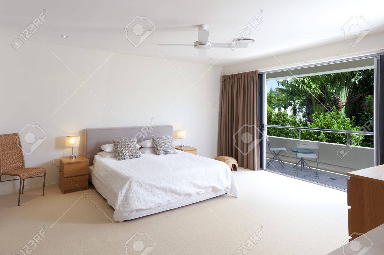 Master Bedroom King Size Bed large master bedroom with king size bed and balcony stock photo Master Bedroom King Size Bed large master bedroom with king size bed and balcony stock photo