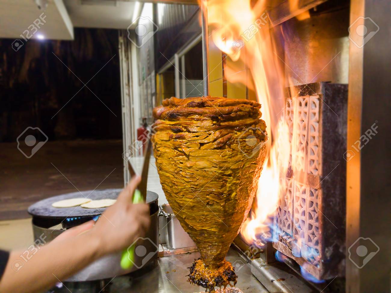 Trompo De Pastor, Mexican Tacos Al Pastor Stock Photo, Picture and Royalty  Free Image. Image 93284968., image size:1300x975