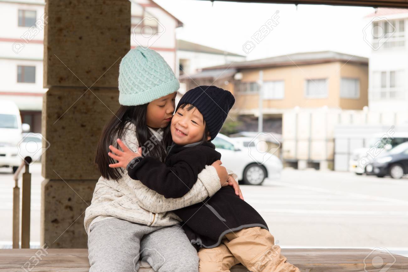 Asian Girl Kisses