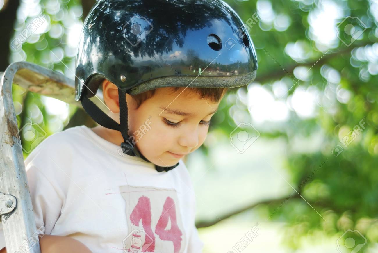 kid with helmet on
