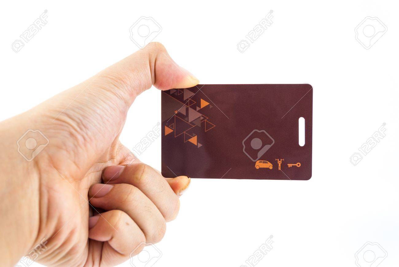 手を保持しているセキュリティ クリアランス キー カードは 白で隔離 の写真素材 画像素材 Image